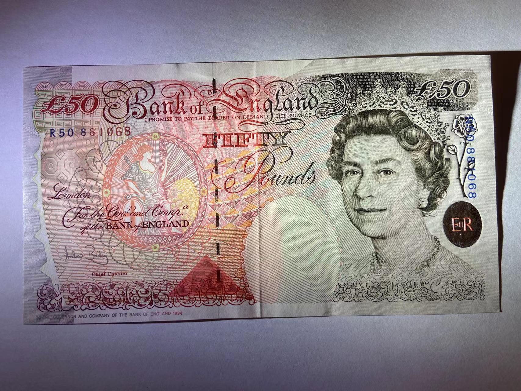 【炜奕收藏】旧钞专场，全场0+1，无最低佣金 英国E序列50磅纸币，AUC+品相，号码倒置号