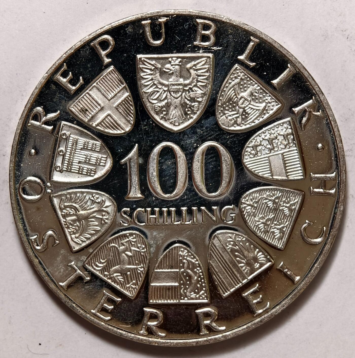 紫瑗钱币——第372期拍卖 奥地利 1976年 因斯布鲁克冬奥运 主会场 100先令 24克 0.64银 精制