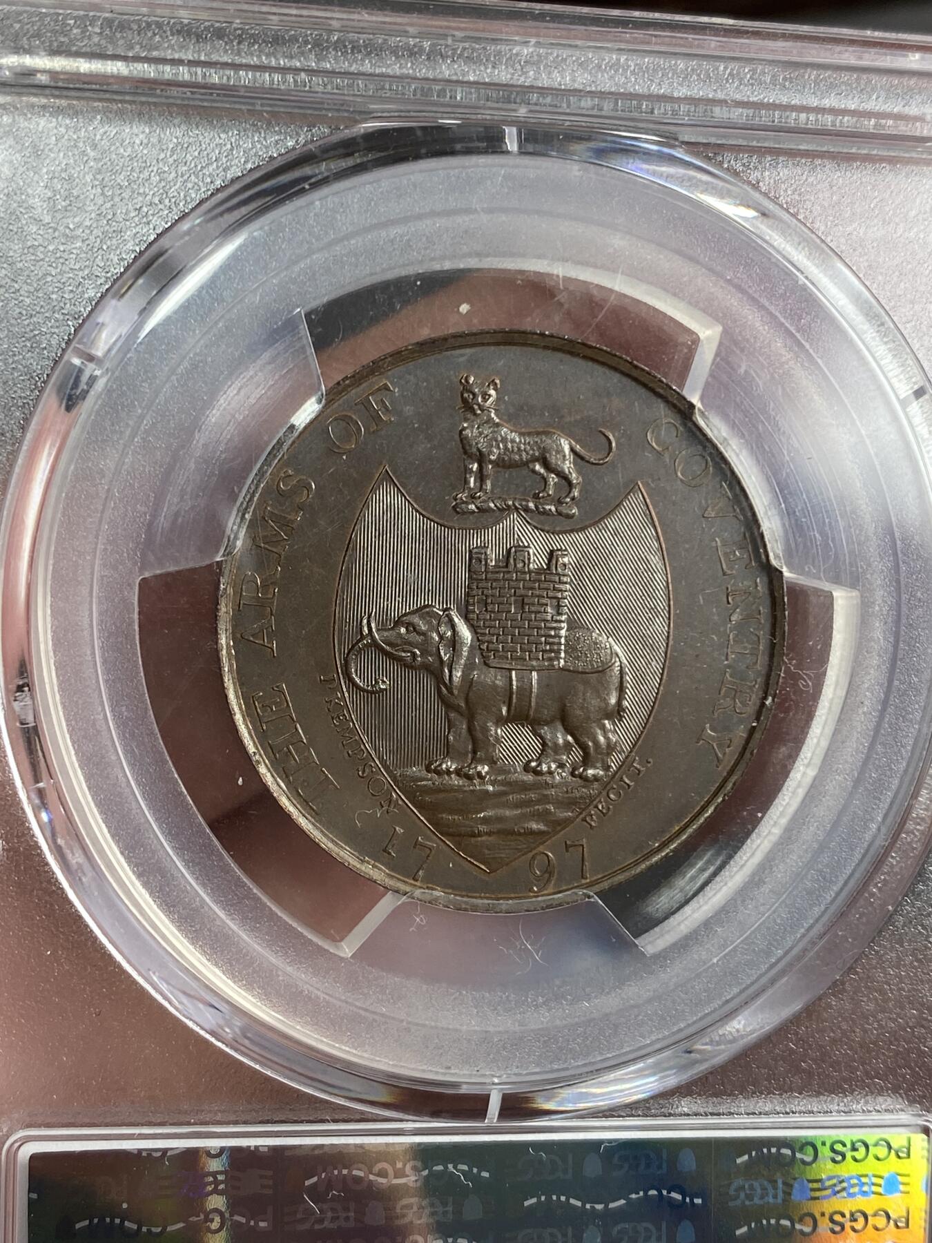 万国钱币拍卖第026期（风云再起·勇士无畏） PCGS PR64 1797年英国沃里克郡精致铜制半便士代用币 精度非常高 钢铁般的蓝色色调和镜面的底板 极其罕见