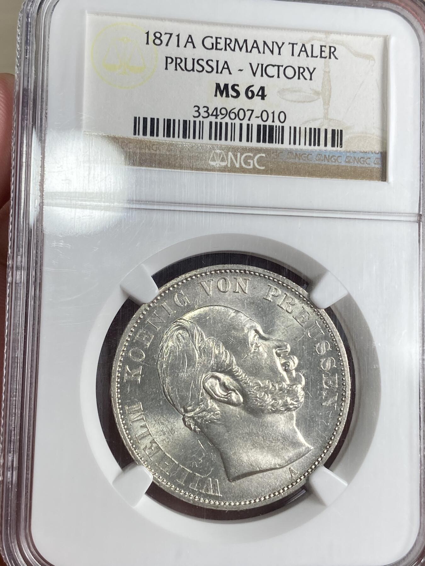 万国钱币拍卖第026期（风云再起·勇士无畏） NGC MS64 1871年德国普鲁士普法战争胜利流通纪念1泰勒 胜利泰勒现在要找一枚好的真不是易事 特别日耳曼尼娅女神脸如此清晰
