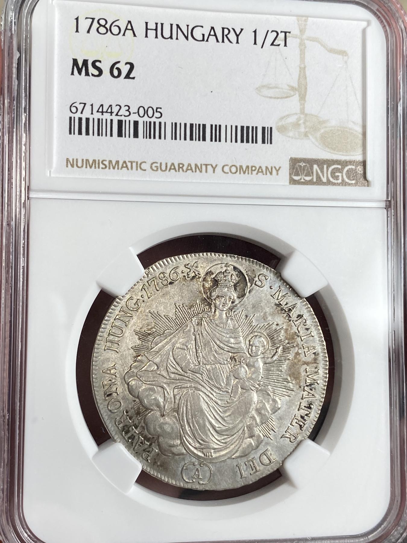 万国钱币拍卖第026期（风云再起·勇士无畏） NGC MS62 1786年匈牙利帝国圣母抱婴1/2泰勒 稀少品种 双天使手持匈牙利盾徽 圣母抱婴系列算是欧洲的经典画面