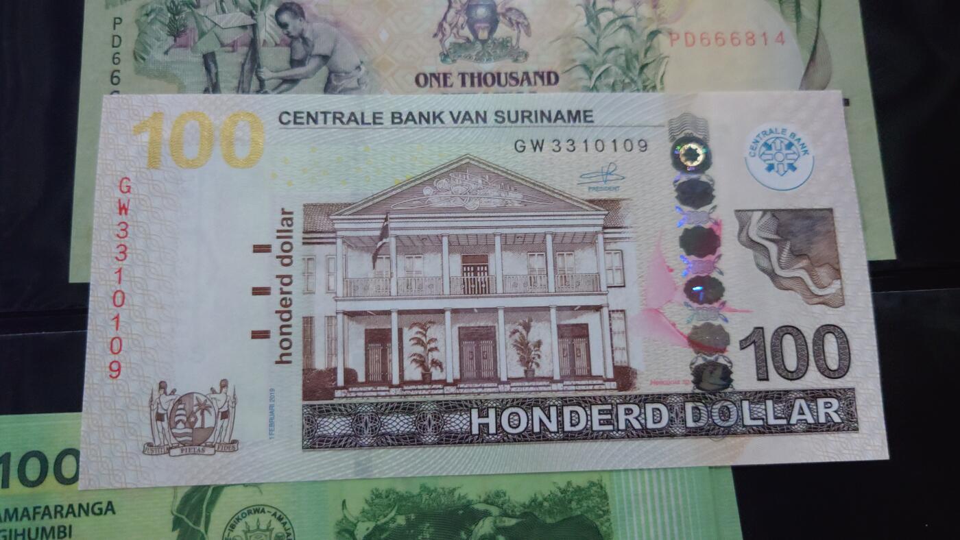 【世界钱币】精选微拍第108期暨2024年第19期  评级币裸钞混合版 2012年苏里南100元 全新绝品无47 尾号109