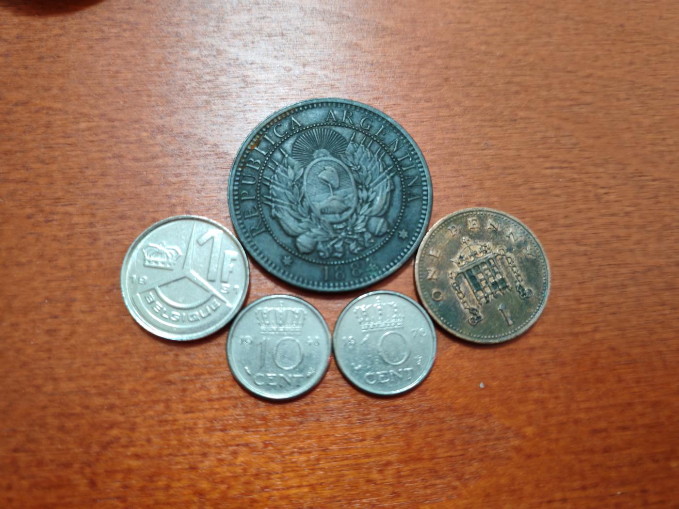 长老汇龙年散币拍卖第一场 1884-1991阿根廷、英国、荷兰、比利时铜镍币，5枚，其中荷兰1948年25分和阿根廷1884年2分是好品
