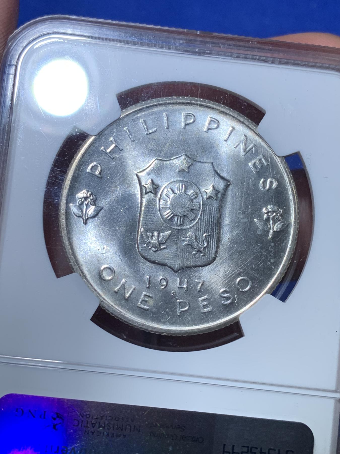 《竞宝斋》第272场- 周日，周一，周二  3场连拍 （全场包邮） NGC MS64  菲律宾1947年麦克阿瑟1比索纪念银币 币原霜光强烈带边道环彩 五星评论家 菲律宾和日本太上皇