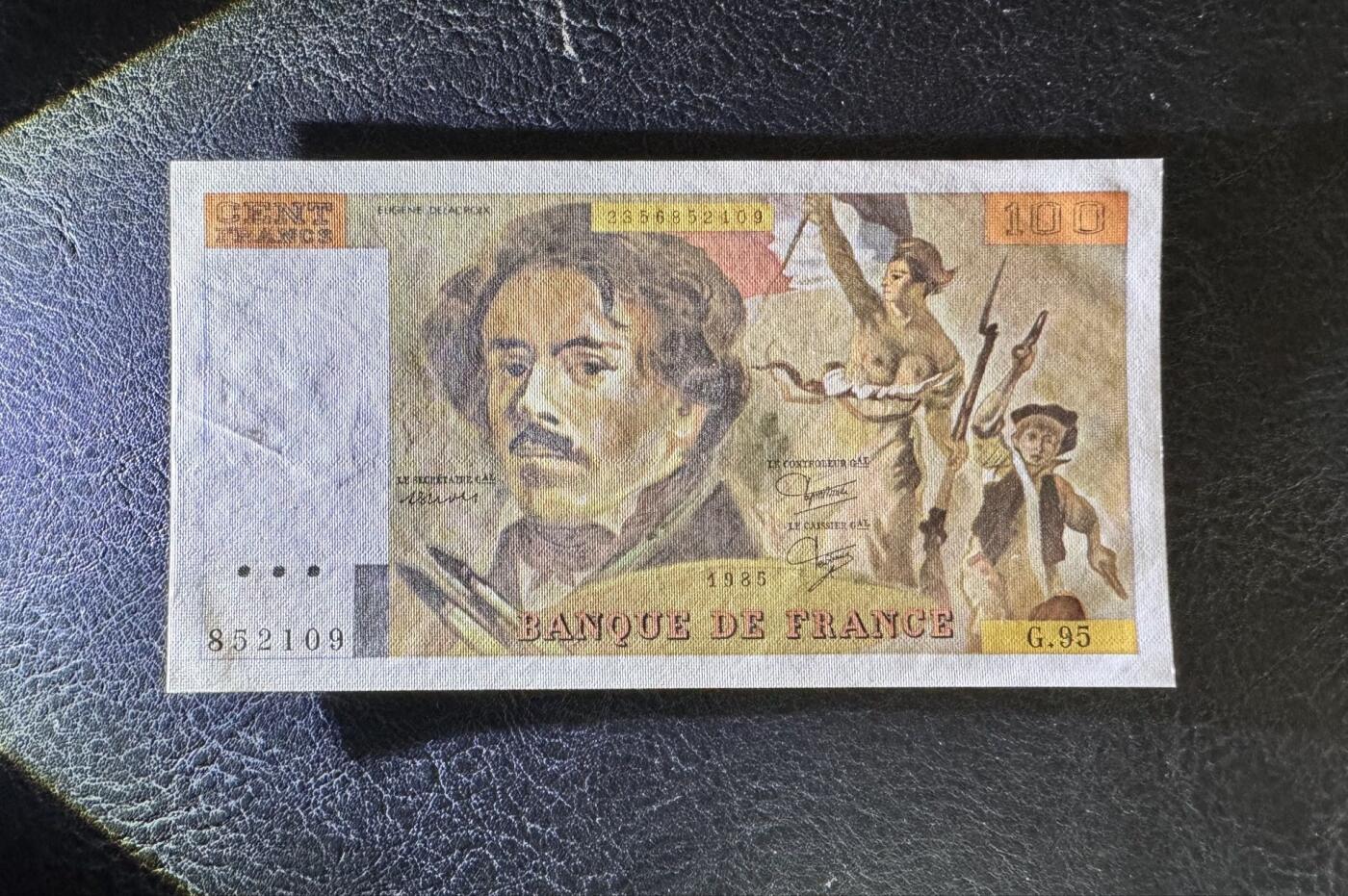 收藏联盟Quantum Auction 第349期拍卖  法国1985年100法郎 品相UNC- 水印处有瑕疵 德拉克洛瓦
