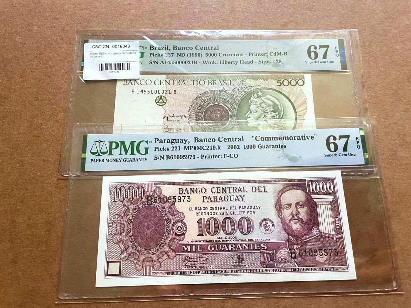 【Blue Auction】✨世界纸币精拍第482期【精】 【一组2张】巴西 1990年5000克鲁塞罗&巴拉圭 2002年1000瓜拉尼 PMG67EPQ 高分