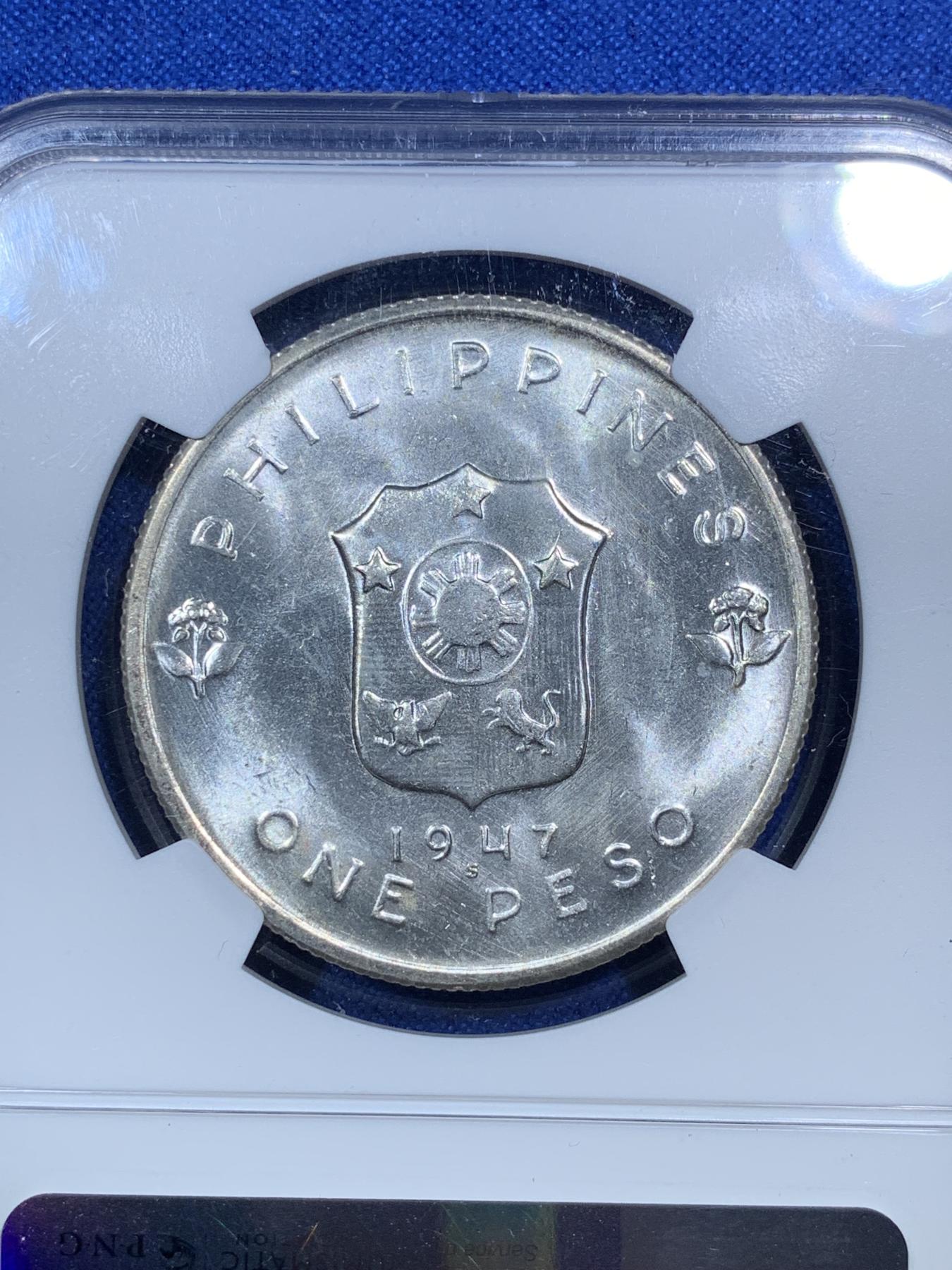 《竞宝斋》第272场- 周日，周一，周二  3场连拍 （全场包邮） NGC MS64  菲律宾1947年麦克阿瑟1比索纪念银币 币原霜光强烈带边道环彩 五星评论家 菲律宾和日本太上皇