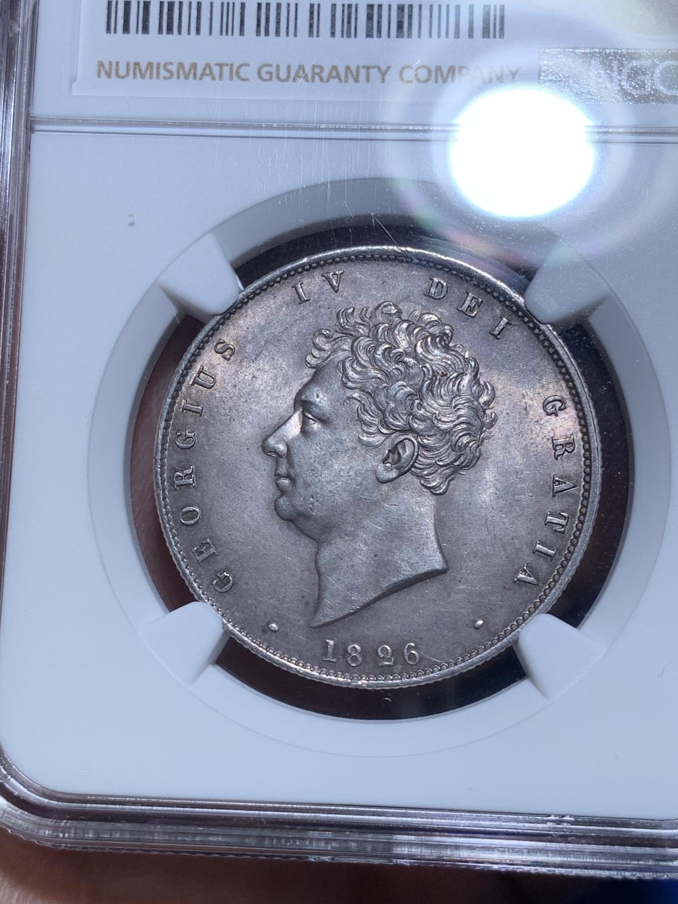 《竞宝斋》第272场- 周日，周一，周二  3场连拍 （全场包邮） NGC MS63 英国1826乔治四世半克朗 盾徽版 背面图案精美 栩栩如生 高品比三花版少见 也比1825少 深彩包浆 收藏佳品 乔四一直都是英系大热！