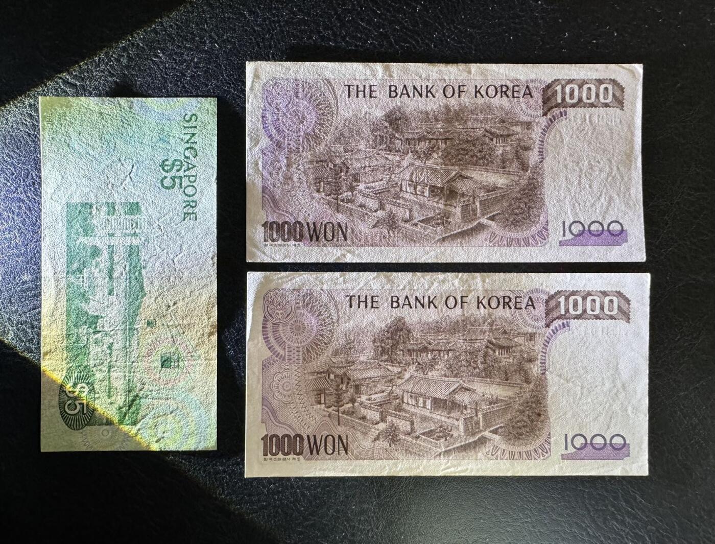收藏联盟Quantum Auction 第349期拍卖  新加坡鸟版5元豹子号和韩国1983版1000元豹子号两张 品相如图 号码无4