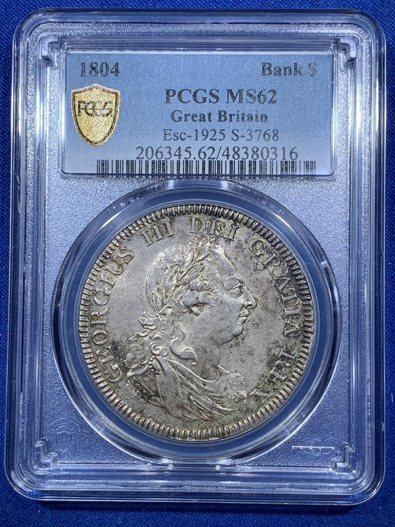 《竞宝斋》第272场- 周日，周一，周二  3场连拍 （全场包邮） PCGS MS62 英国1804乔治三世英格兰银行五先令银币 通体原味深彩包浆 深打 底板的双柱币胚依稀可见 底板丝滑 比一般的62感官上好一些