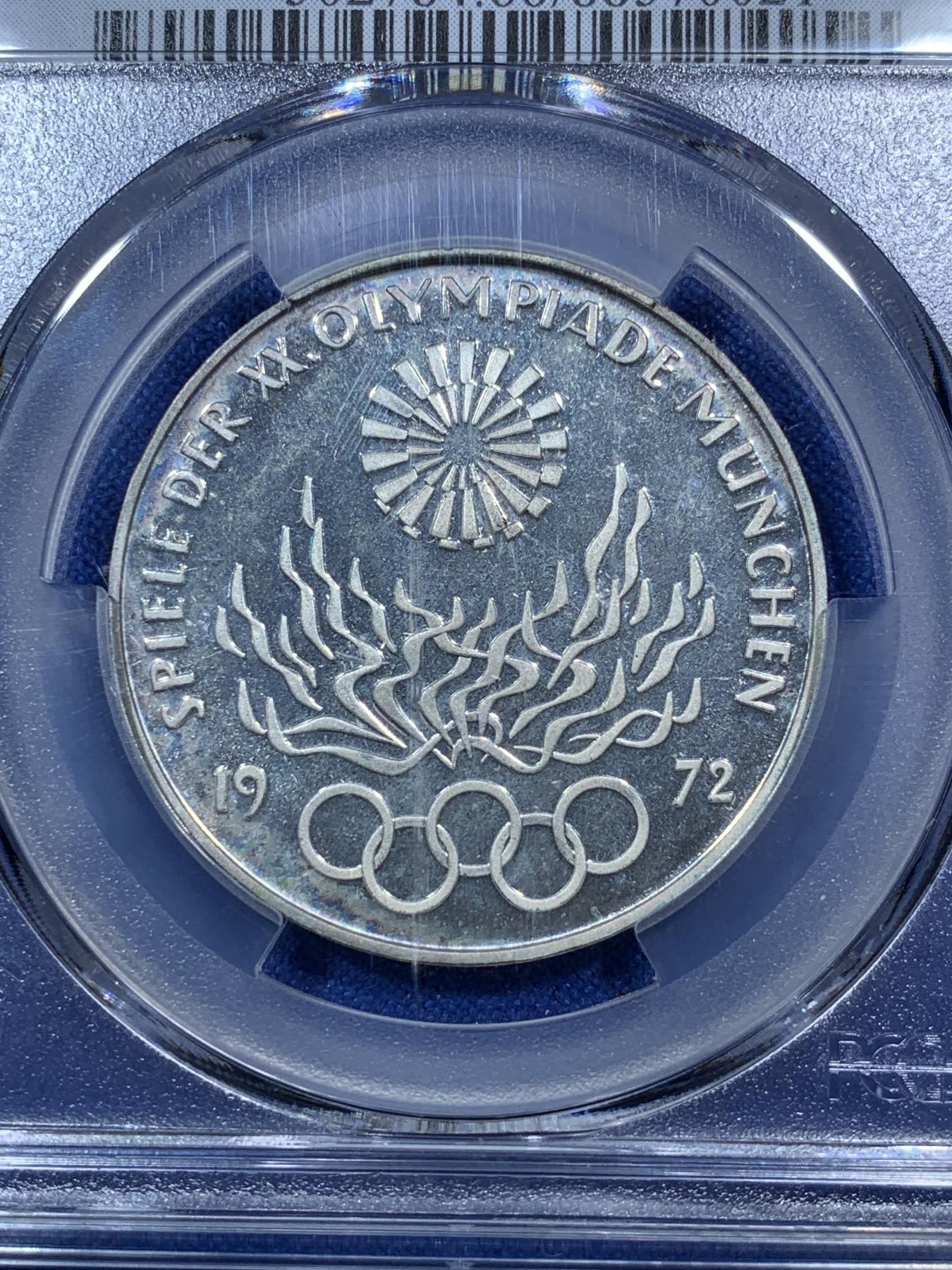 《竞宝斋》第272场- 周日，周一，周二  3场连拍 （全场包邮） PCGS PR66DCAM德国1972年慕尼黑奥运会纪念精致银币 期间发生了奥运史上最血腥的惨案“慕尼黑惨案”。德国仅举办过2届奥运会，分别是1936年的柏林奥运会和1972年的慕尼黑奥运会。此枚纪念意义非凡，高分可藏！