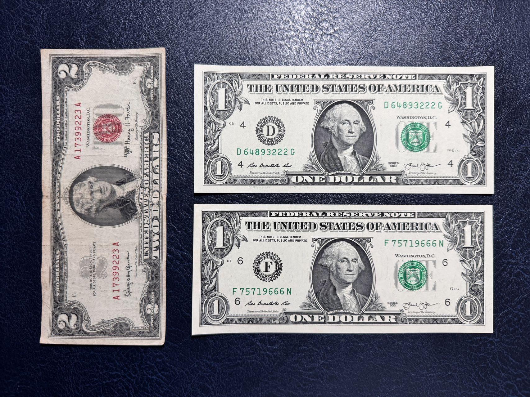 收藏联盟Quantum Auction 第349期拍卖  美国1963年政府券2元和2013年1美元豹子号两张 品相如图 1美元两张都是UNC 其中一张有潮斑