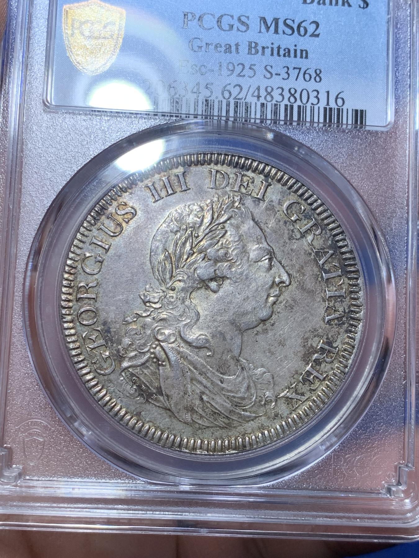 《竞宝斋》第272场- 周日，周一，周二  3场连拍 （全场包邮） PCGS MS62 英国1804乔治三世英格兰银行五先令银币 通体原味深彩包浆 深打 底板的双柱币胚依稀可见 底板丝滑 比一般的62感官上好一些