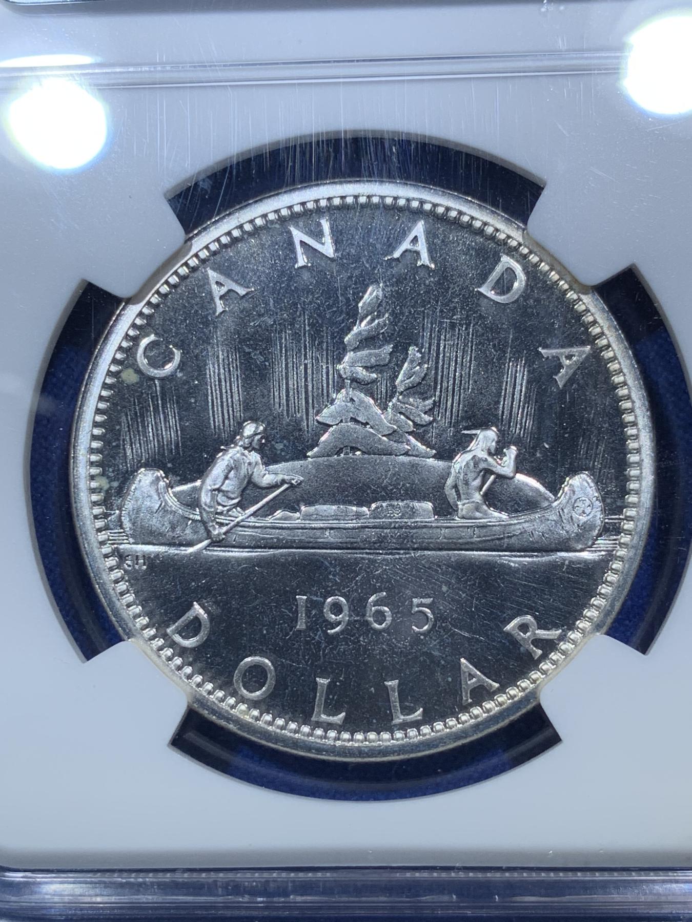 《竞宝斋》第272场- 周日，周一，周二  3场连拍 （全场包邮） NGC PL65 加拿大1965年伊丽莎白二世少妇头像一元划船大银币 小珠子配尖5版别