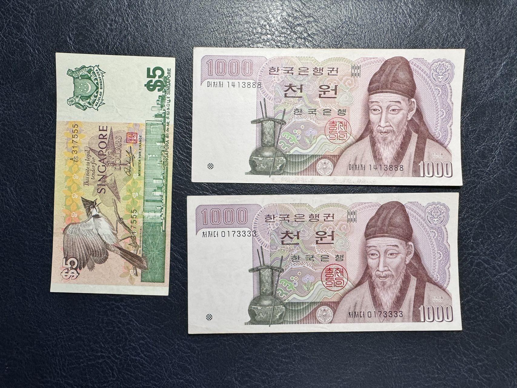 收藏联盟Quantum Auction 第349期拍卖  新加坡鸟版5元豹子号和韩国1983版1000元豹子号两张 品相如图 号码无4