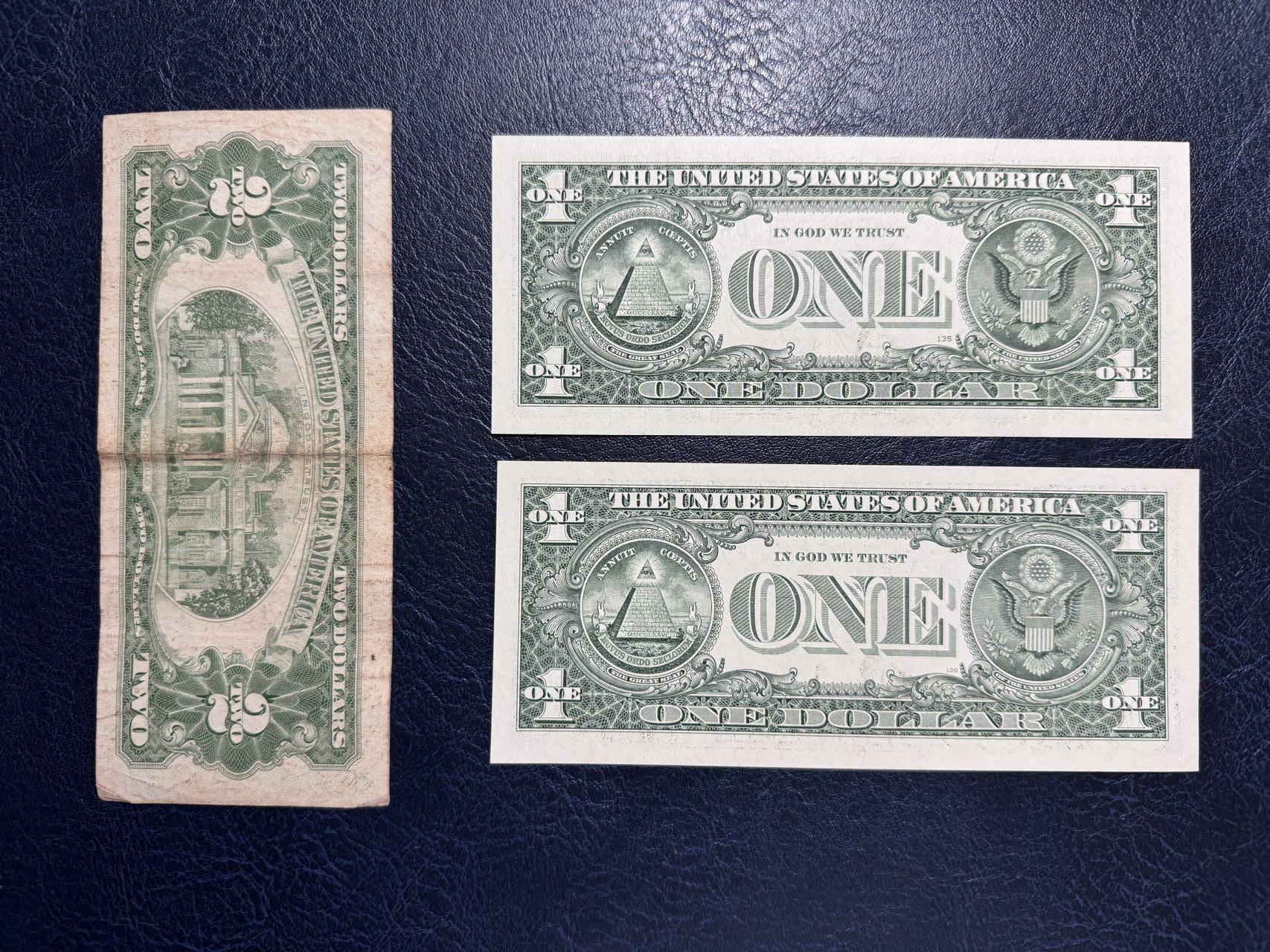 收藏联盟Quantum Auction 第349期拍卖  美国1963年政府券2元和2013年1美元豹子号两张 品相如图 1美元两张都是UNC 其中一张有潮斑