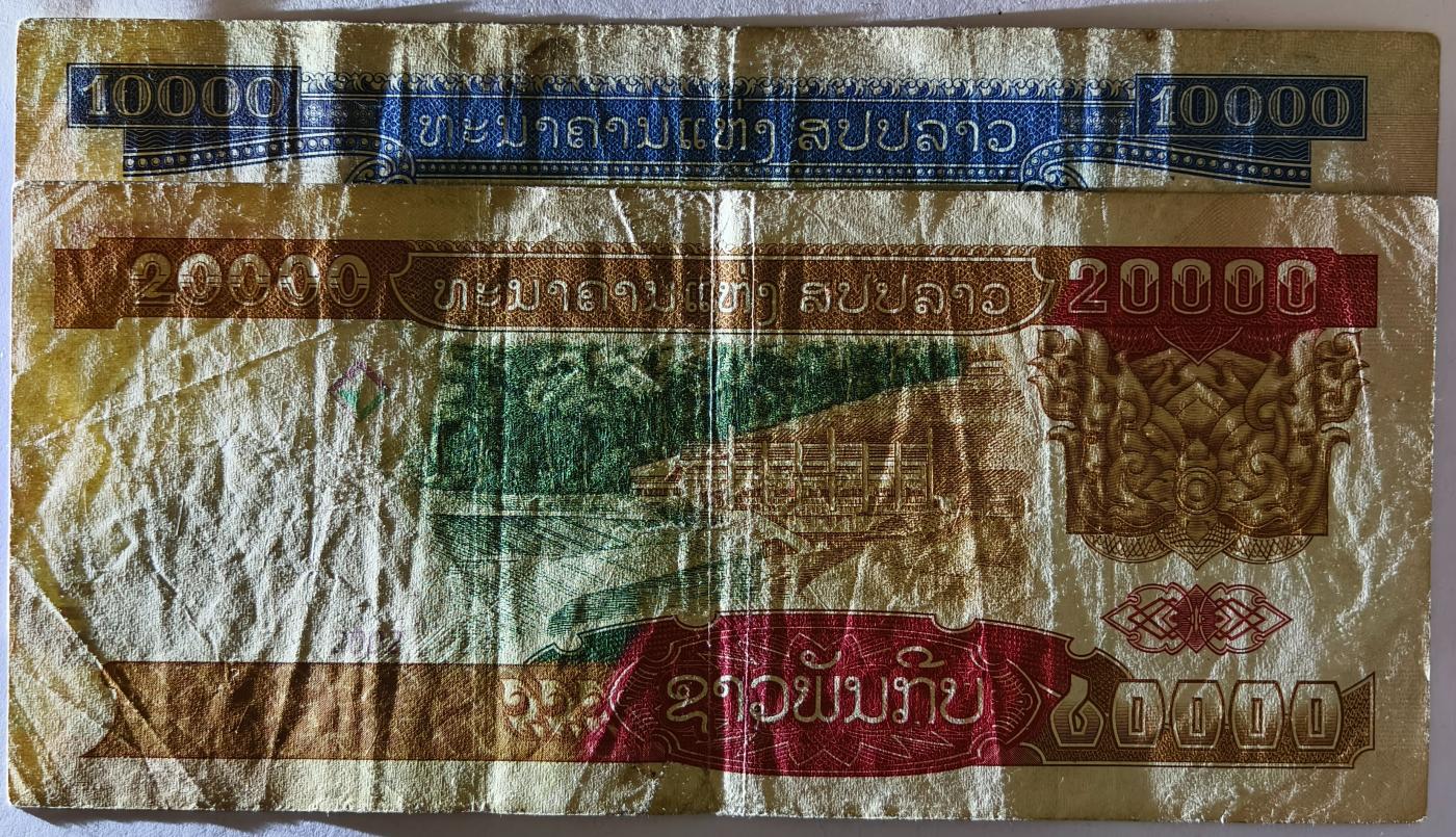 紫瑗钱币——第371期拍卖——纸币场 老挝 2002年 西哈努克亲王 10000 20000 基普 2枚一组 流通品