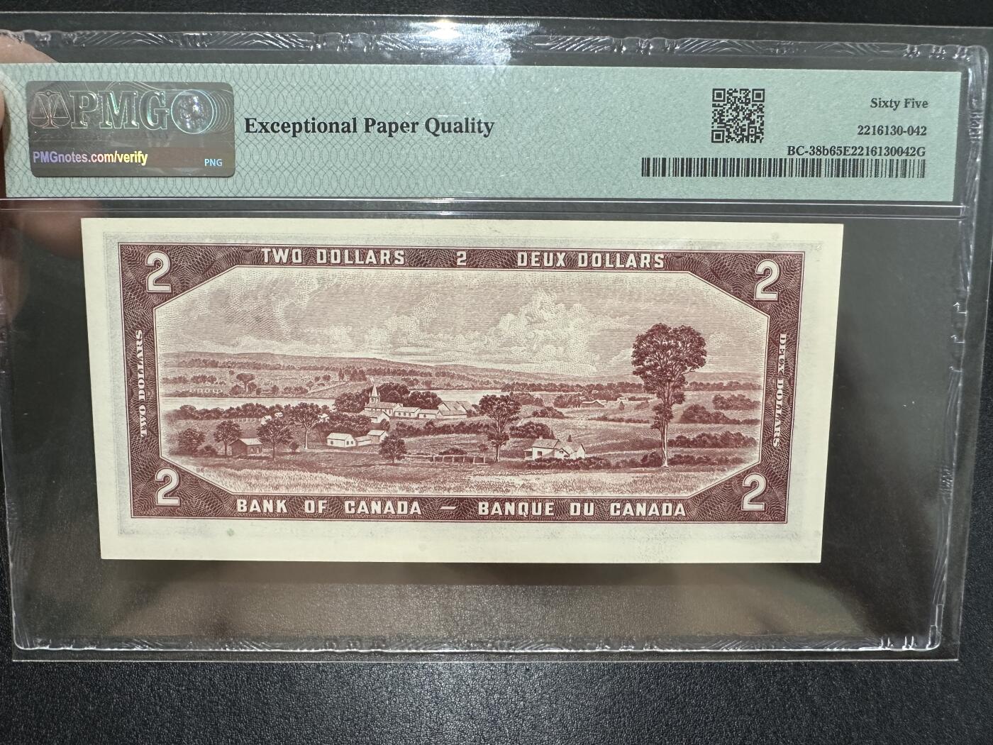 《外钞收藏家》第三百七十三期 1954年加拿大2刀 PMG65 无47