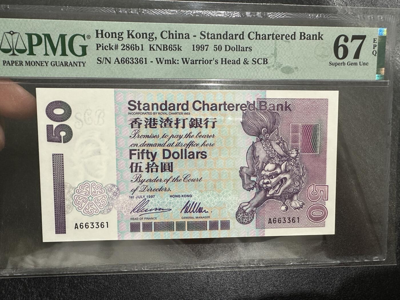 《外钞收藏家》第三百七十三期 1997年香港渣打银行50元 无47 PMG67 A冠 