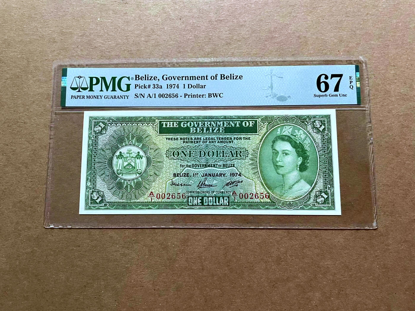 【Blue Auction】✨世界纸币精拍第485期【精】 【A/1首发冠千位小号无47 a版】伯利兹 1974年1元 大冠女王 BWC出品  PMG67EPQ 高分
