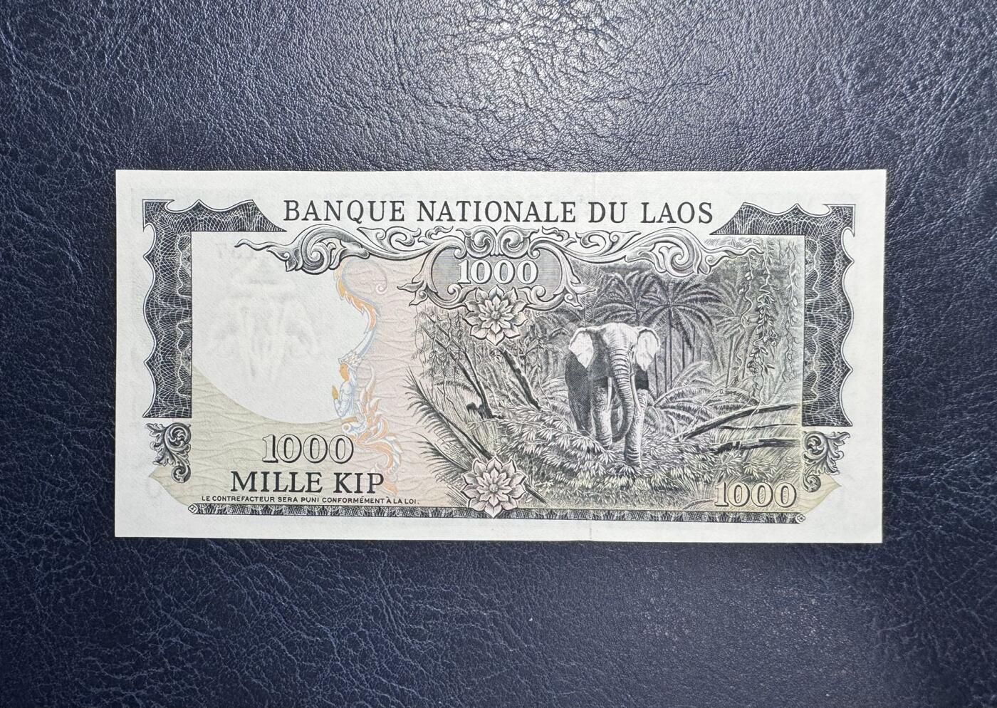 收藏联盟Quantum Auction 第350期拍卖  老挝ND (1974-75)年1000基普 品相UNC 角尖有瑕疵 号码无4乱蛇号