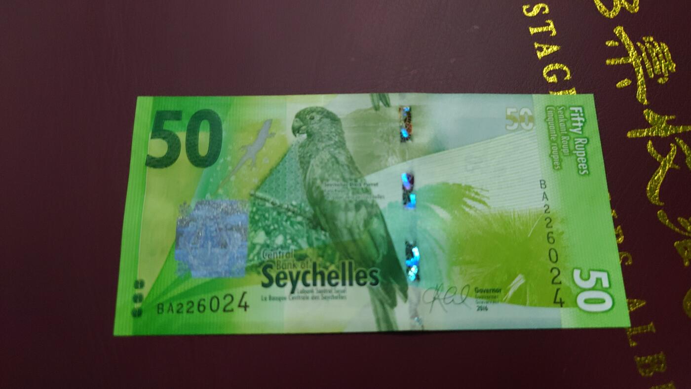 【世界钱币】精选微拍第110期暨2024年第21期  剩余杂货选购 2016年塞舌尔50卢比 首发BA冠全新绝品尾号024