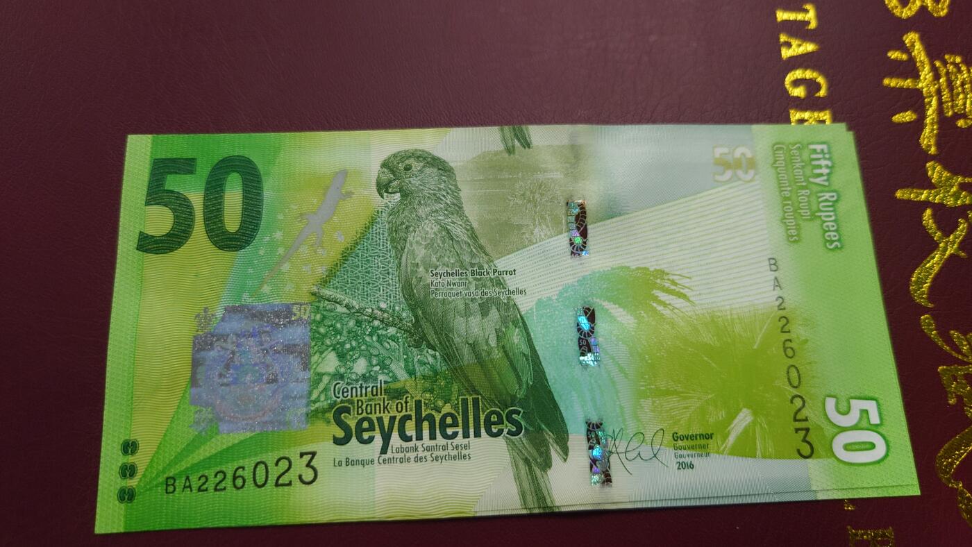 【世界钱币】精选微拍第110期暨2024年第21期  剩余杂货选购 2016年塞舌尔50卢比 首发BA冠全新绝品无47尾号023