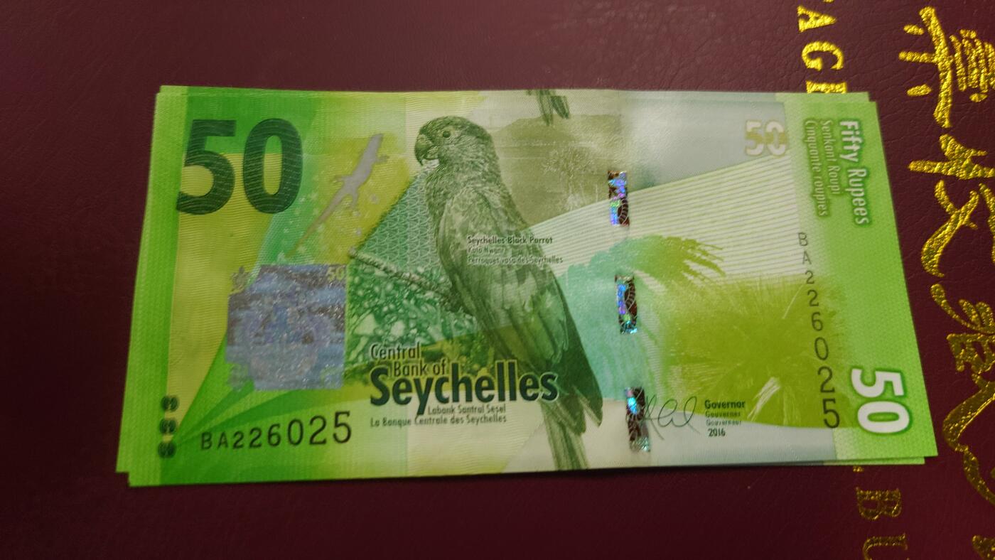 【世界钱币】精选微拍第110期暨2024年第21期  剩余杂货选购 2016年塞舌尔50卢比 首发BA冠全新绝品无47尾号025 