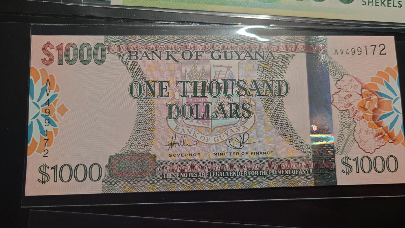 【世界钱币】精选微拍第110期暨2024年第21期  剩余杂货选购 2006年圭亚那1000 全新绝品尾号172