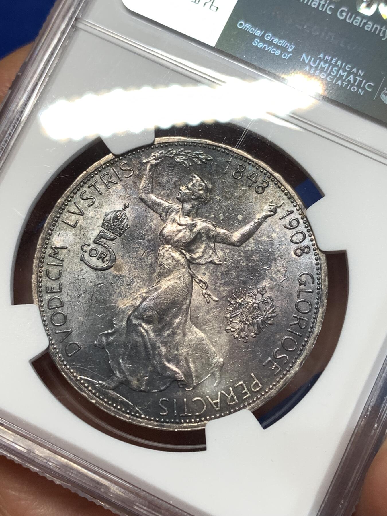 《竞宝斋》第276场- 周日，周一 2场连拍 （全场包邮） NGC MS61 奥地利1908年约瑟夫加冕60周年纪念5克朗银币 黑紫色包浆 转光感不错 严评