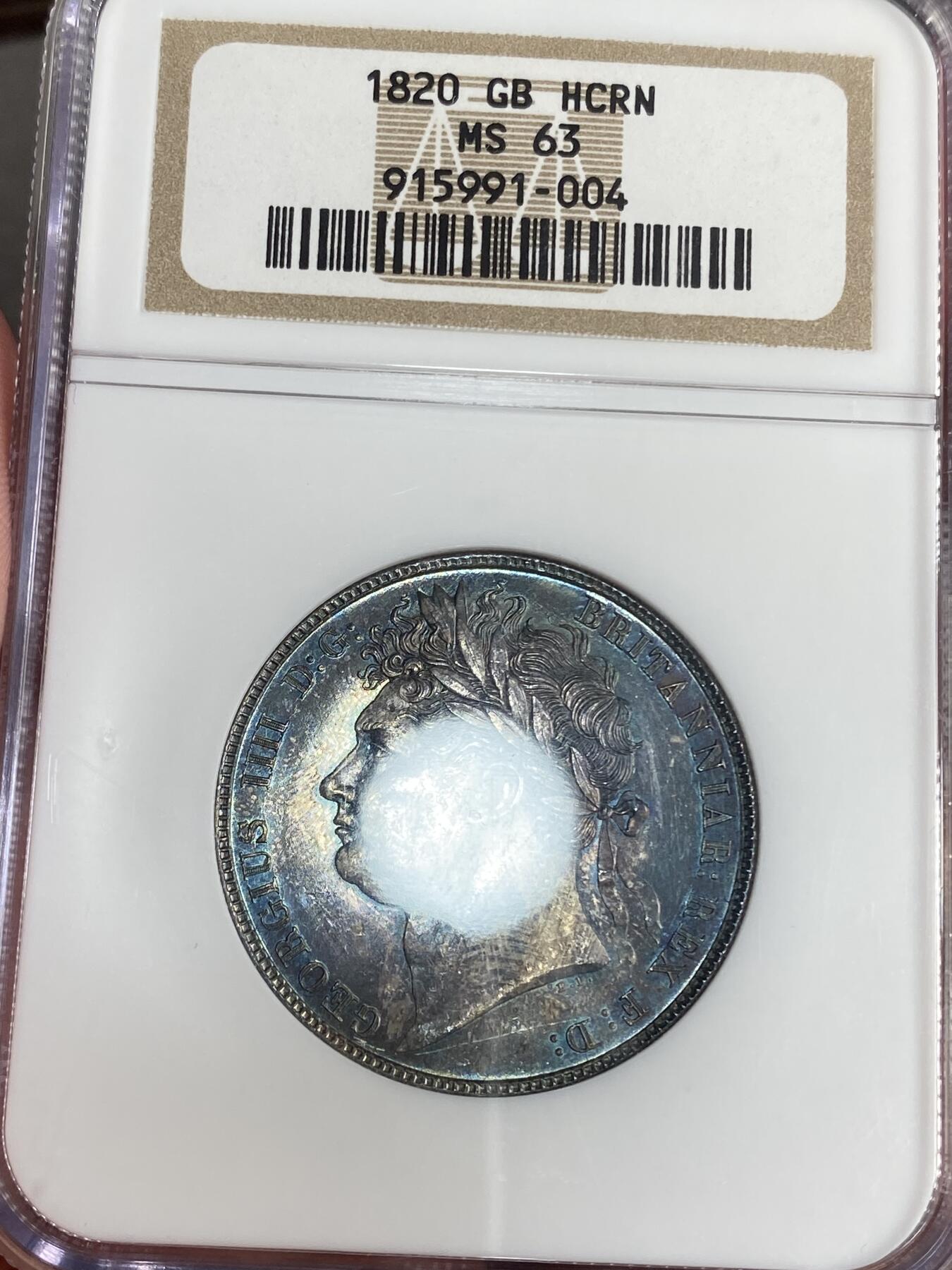 【麦稀奇世界钱币展】万国钱币拍卖第027期（五月端阳●万国夏季大拍） NGC MS63 1820年英国乔治四世半克朗银币 英系独有乌云包浆极其美丽 NGC老白盒加持升值空间不可估量