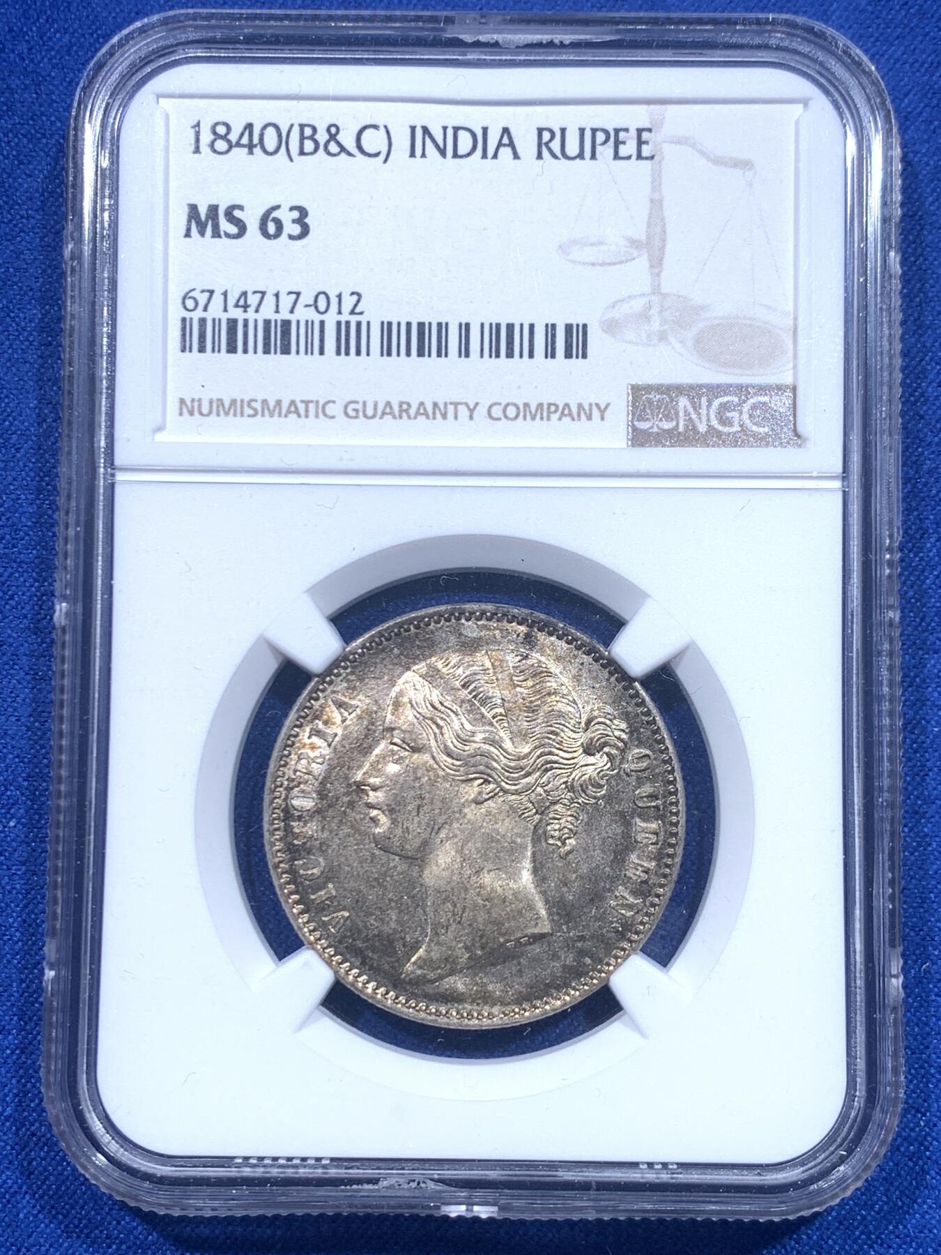 《竞宝斋》第276场- 周日，周一 2场连拍 （全场包邮） NGC MS63 英属东印度公司1840年维多利亚女王1卢比银币 孟买或者加尔各达制造。白币烂大街，彩浆百里挑一，黄赭包浆参杂一丝淡淡紫罗兰，兼具古朴与灵动。包浆币sbp成交价往往在240美金。