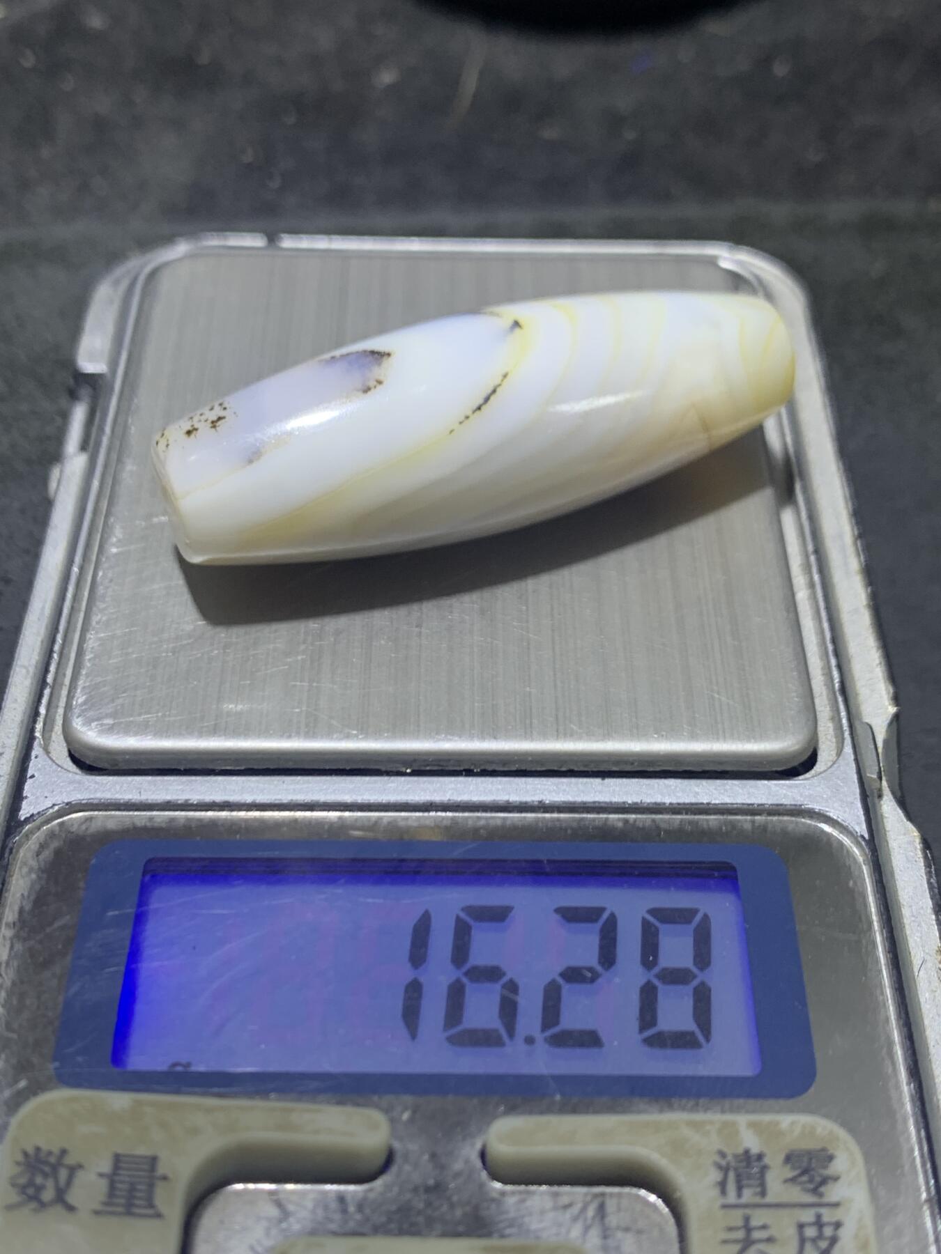 精美马达加斯加天眼草花纹海洋玉髓桶珠一颗，