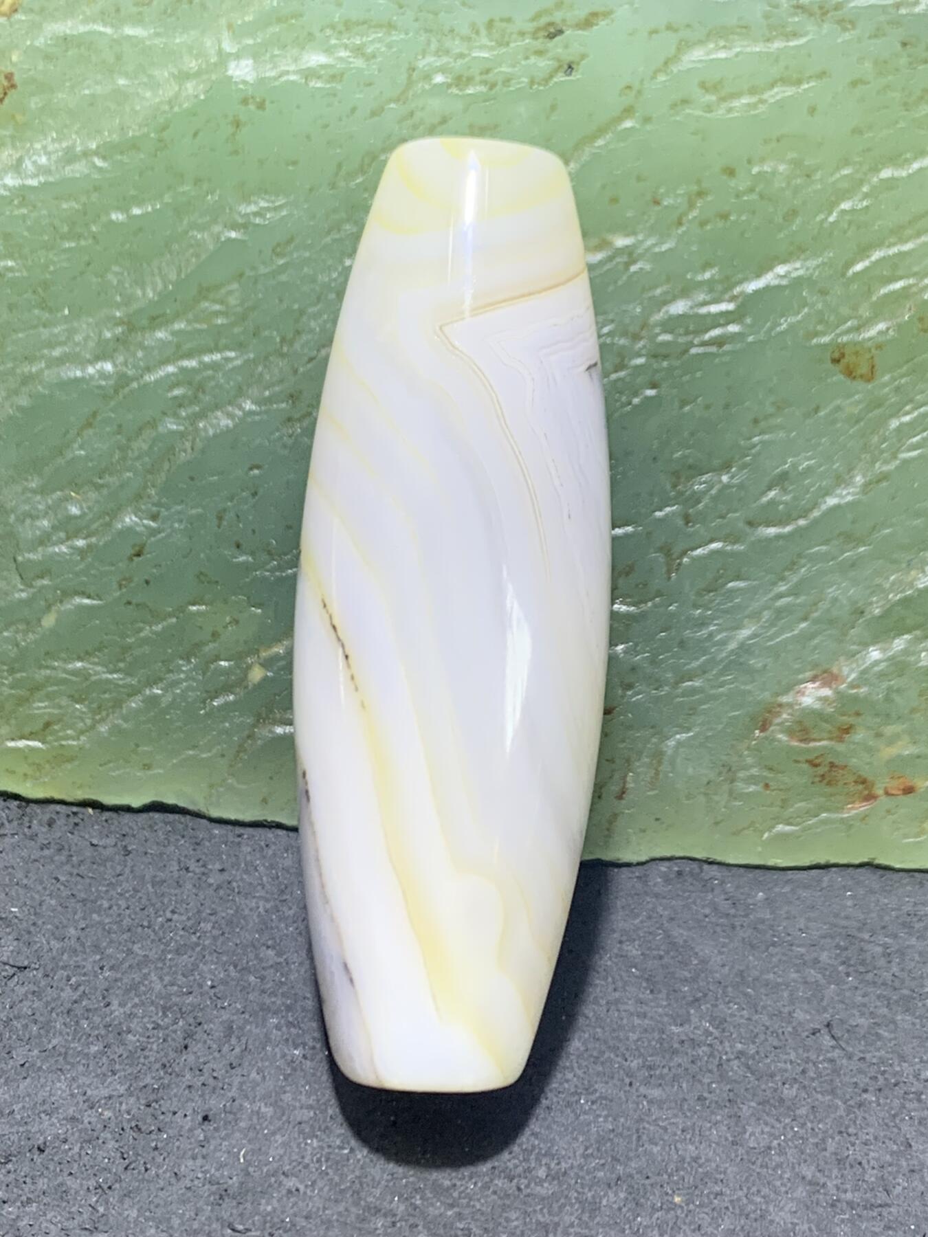 精美马达加斯加天眼草花纹海洋玉髓桶珠一颗，