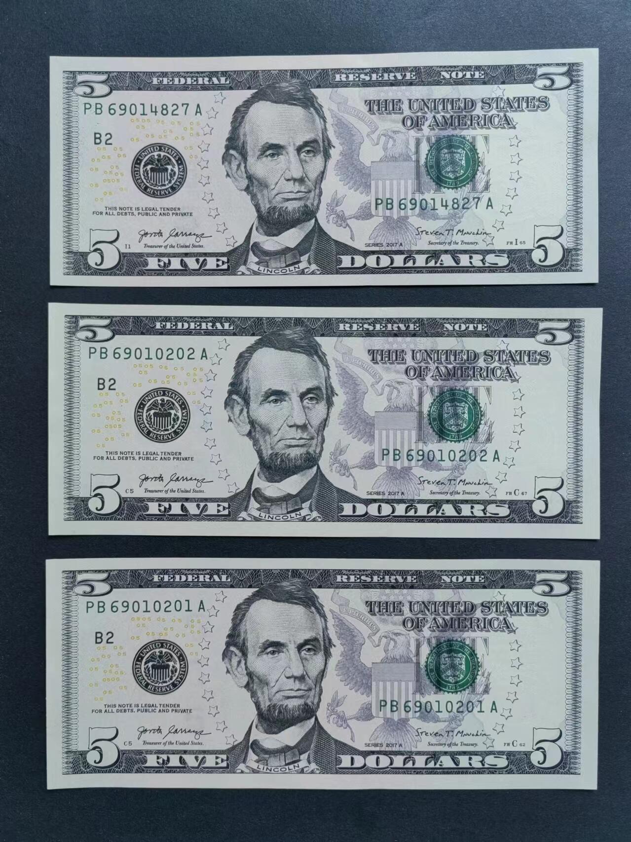 外国币专场20240608第七场 美国2017A年版5元UNC灯下有斑三张