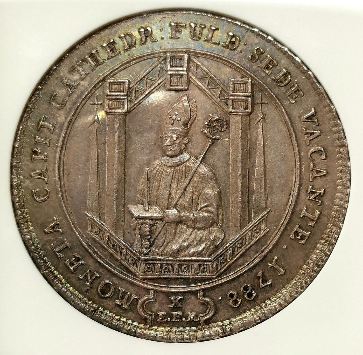 凡希社世界钱币微拍第二百七十二期 荐！1788富尔达主教区主教缺位泰勒大银NGC-UNCD，稀少一年型。深色紫金彩，包浆绝佳底板一流的收藏级精品！