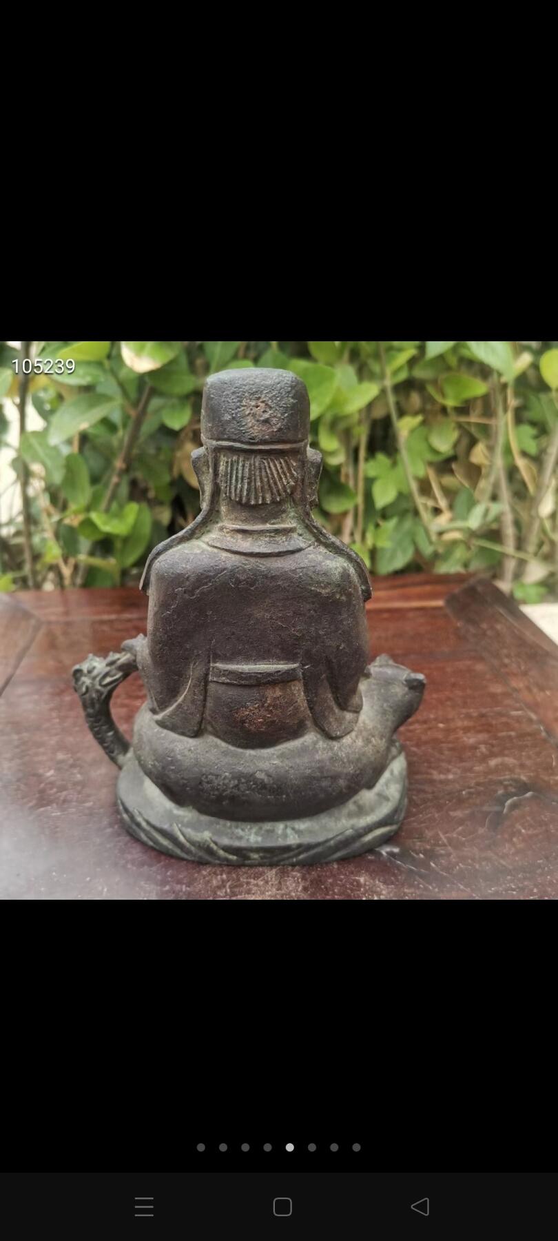 铜佛像一个，品相如图，铁钉做膜，如图可见