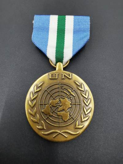 老王徽章第四十三期 - 联合国维和奖章（联塔观察团）    具体介绍看截图