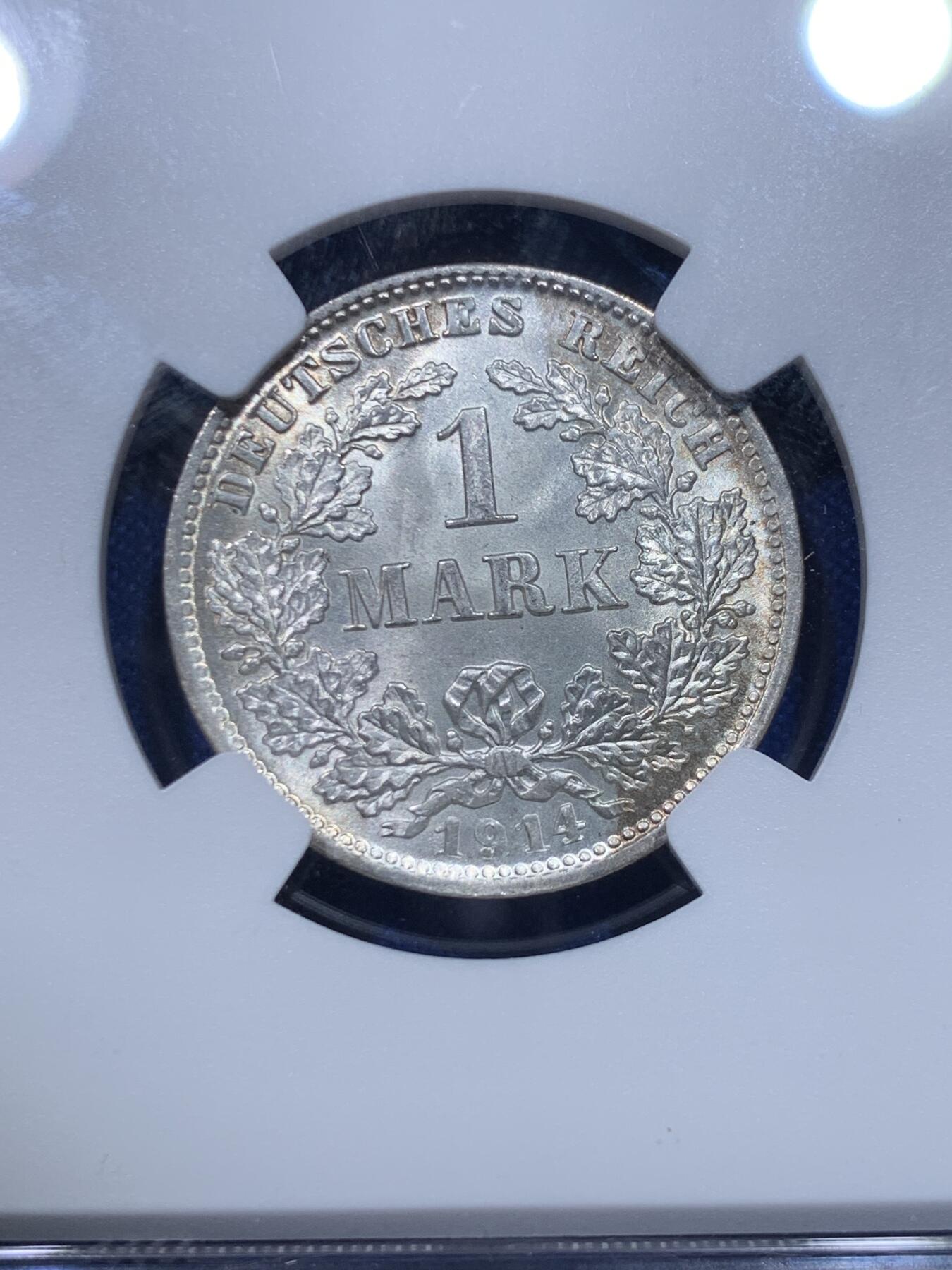 《竞宝斋》第277场- 周日，周一 2场连拍 （全场包邮） NGC MS67 德国1914-D 1马克银币 卷拆的几枚送上海给出的唯一极高分，送评过的该懂其含金量，币面状态如同刚刚铸造，光晕流转没有丝毫阻碍，深打德意志鹰栩栩如生，淡彩包浆自然生动，无可挑剔。