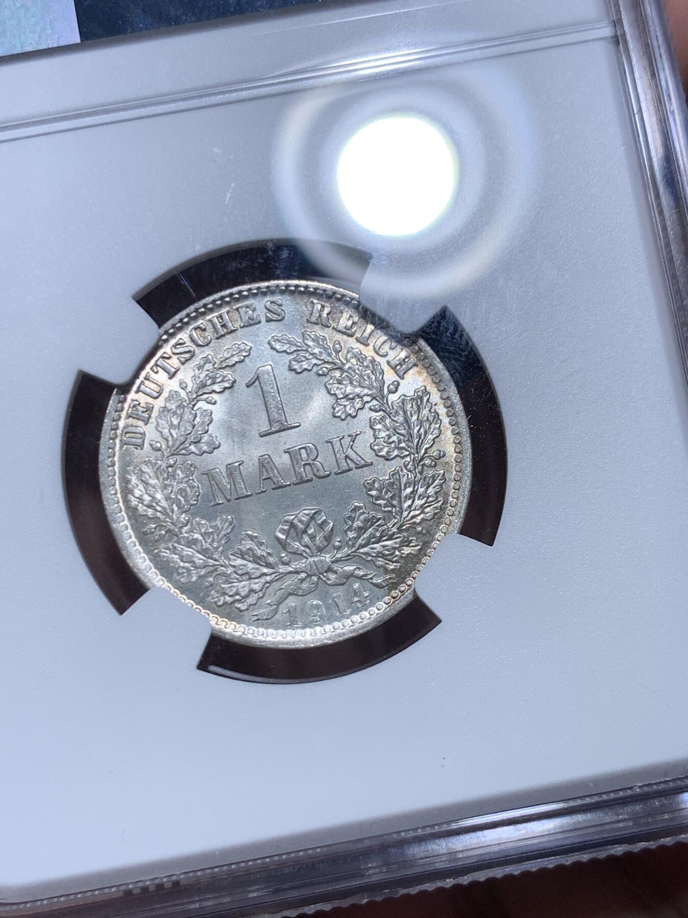 《竞宝斋》第277场- 周日，周一 2场连拍 （全场包邮） NGC MS67 德国1914-D 1马克银币 卷拆的几枚送上海给出的唯一极高分，送评过的该懂其含金量，币面状态如同刚刚铸造，光晕流转没有丝毫阻碍，深打德意志鹰栩栩如生，淡彩包浆自然生动，无可挑剔。