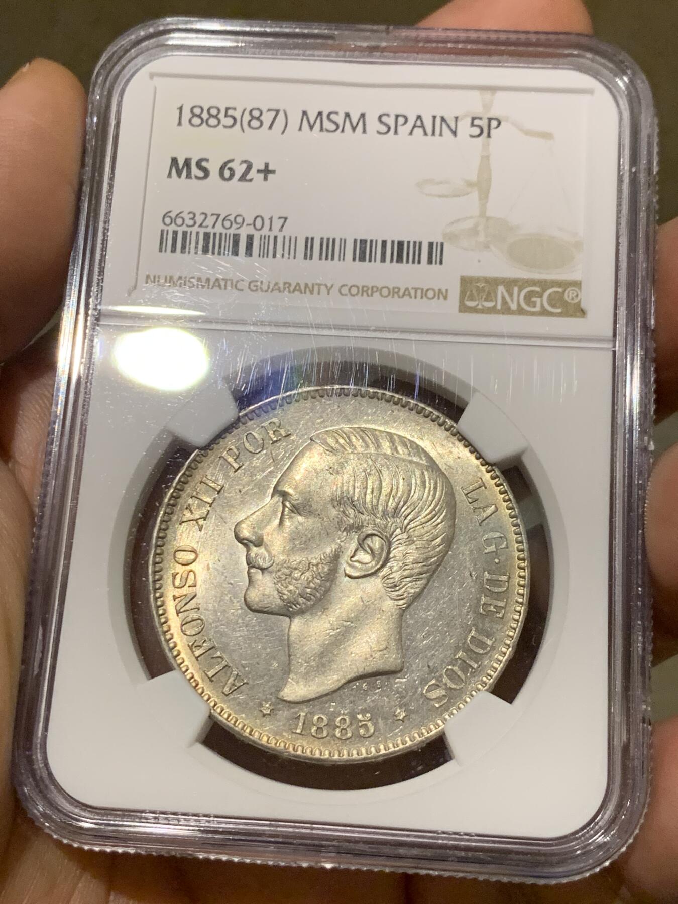 《竞宝斋》第277场- 周日，周一 2场连拍 （全场包邮） NGC MS62+ 西班牙 1885（87）阿方索十二世5比塞塔银币 十字车轮转光黄油淡彩 西属收藏级品种