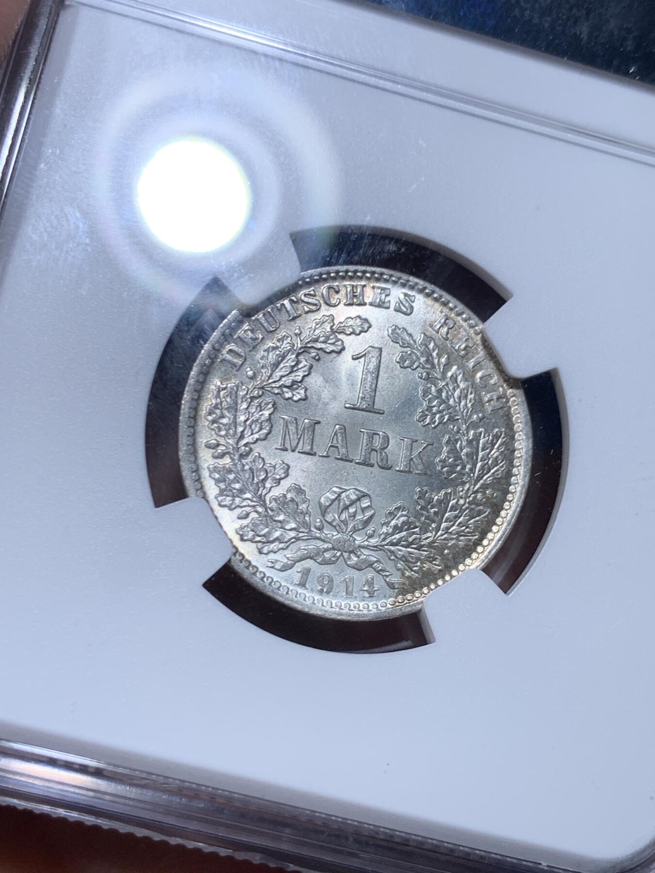 《竞宝斋》第277场- 周日，周一 2场连拍 （全场包邮） NGC MS67 德国1914-D 1马克银币 卷拆的几枚送上海给出的唯一极高分，送评过的该懂其含金量，币面状态如同刚刚铸造，光晕流转没有丝毫阻碍，深打德意志鹰栩栩如生，淡彩包浆自然生动，无可挑剔。