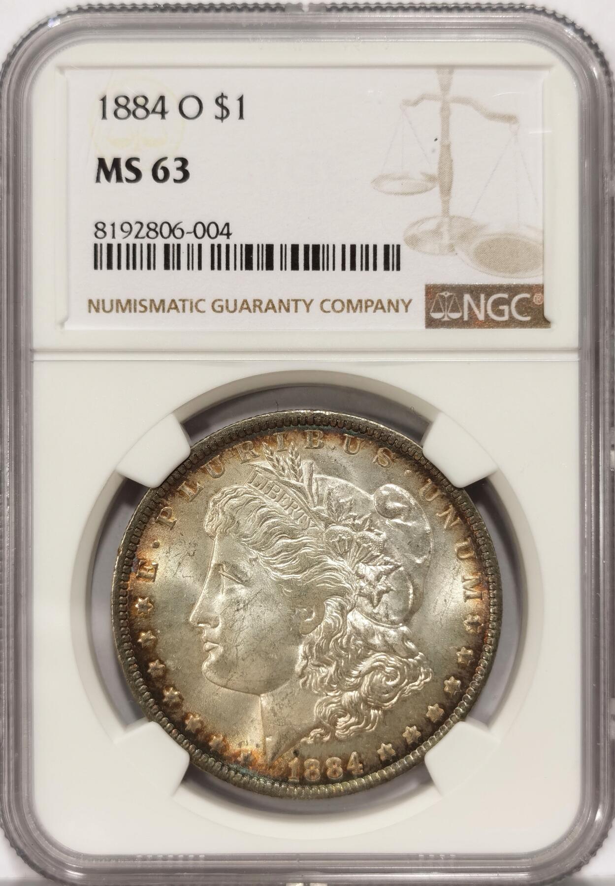 【麦稀奇世界钱币展】博洋堂“流萤染夏”六月精品专场暨第081期（全场包邮） NGC MS63 美国1884年O版摩根大银币，极美环绕五彩