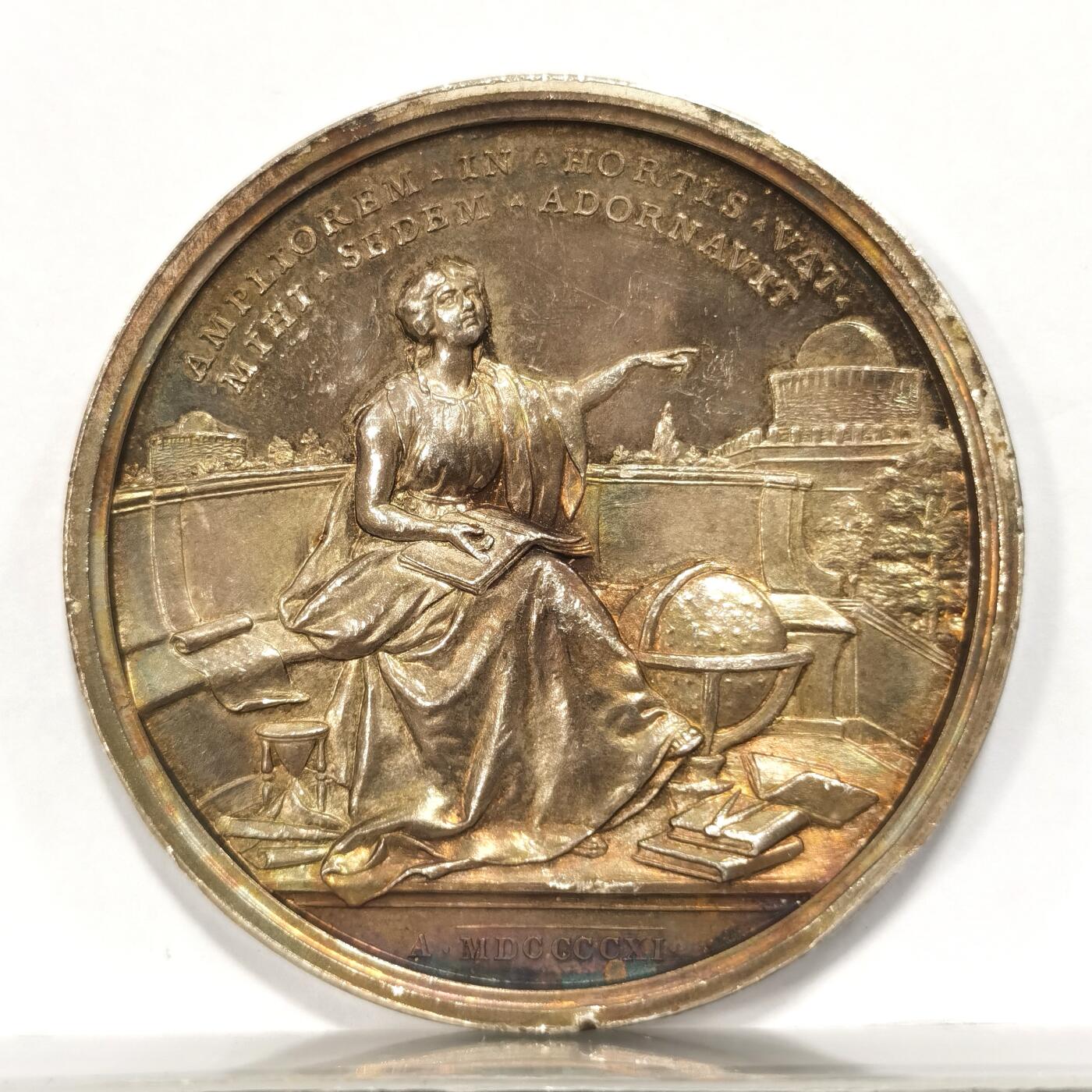 【麦稀奇世界钱币展】博洋堂“流萤染夏”六月精品专场暨第081期（全场包邮） 1911年梵蒂冈教皇庇护十世银章，重量36.5克，直径 43.7毫米。典型的地中海紫罗兰包浆，非常漂亮，某鱼上N盒65分标价6000元