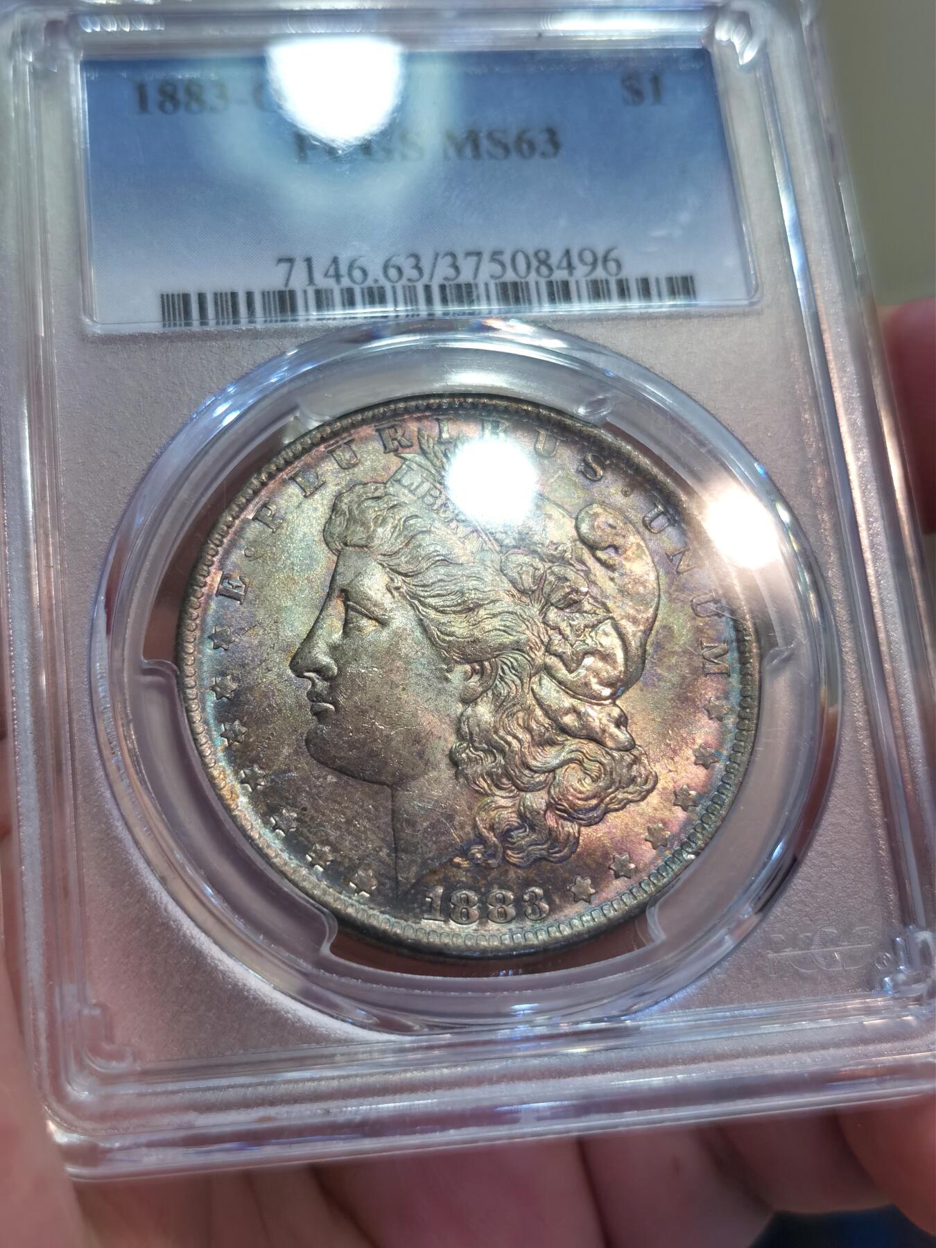 【麦稀奇世界钱币展】博洋堂“流萤染夏”六月精品专场暨第081期（全场包邮） PCGS MS63 1883年美国摩根银币O版 黑五彩，包浆入骨
