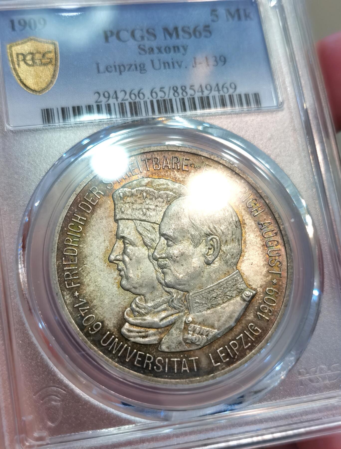 【麦稀奇世界钱币展】博洋堂“流萤染夏”六月精品专场暨第081期（全场包邮） PCGS MS65 德国萨克森1909年莱比锡大学5马克银币 超级炫彩