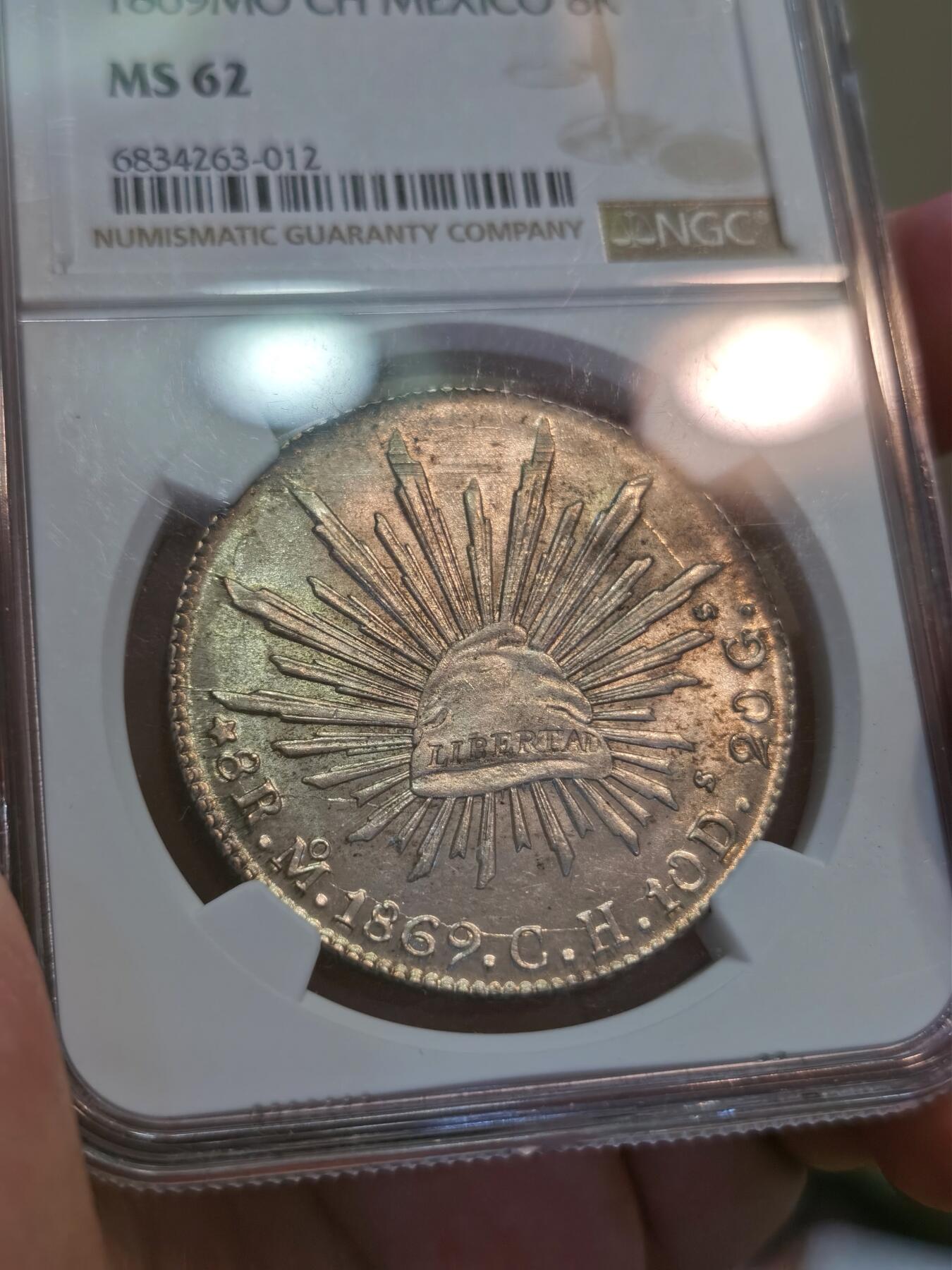 【麦稀奇世界钱币展】博洋堂“流萤染夏”六月精品专场暨第081期（全场包邮） NGC MS62 墨西哥1869年MO CH版花边鹰洋 中期鹰洋 原味深打
