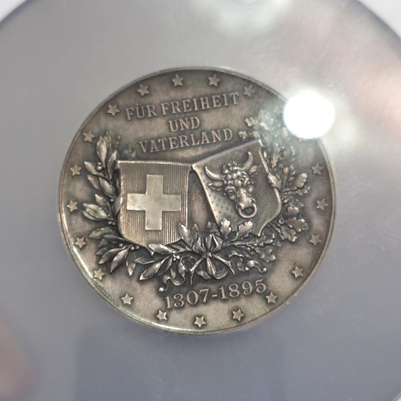 【麦稀奇世界钱币展】博洋堂“流萤染夏”六月精品专场暨第081期（全场包邮） 1895年瑞士乌里州威廉泰尔父子银章，NGC MS63，直径50mm