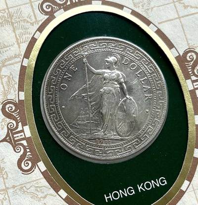 印尼纸币套、古希腊罗马银币、光绪民国铜板、站洋坐洋银币、印尼1970年全银套币经典钱包、马恩黑便士5盎司大银币70满分、法属东京湾六百分之一，各国纪念银币、老铜银币，日本箱馆仙台、琉球当百、秋田锷钱，英国套币、纪念章，彼得堡世界钱币勋章拍卖第100期 - 香港1911年站洋1元贸易银币，90年代装帧的邮币封。AU-~AU品相，优于一般通货品