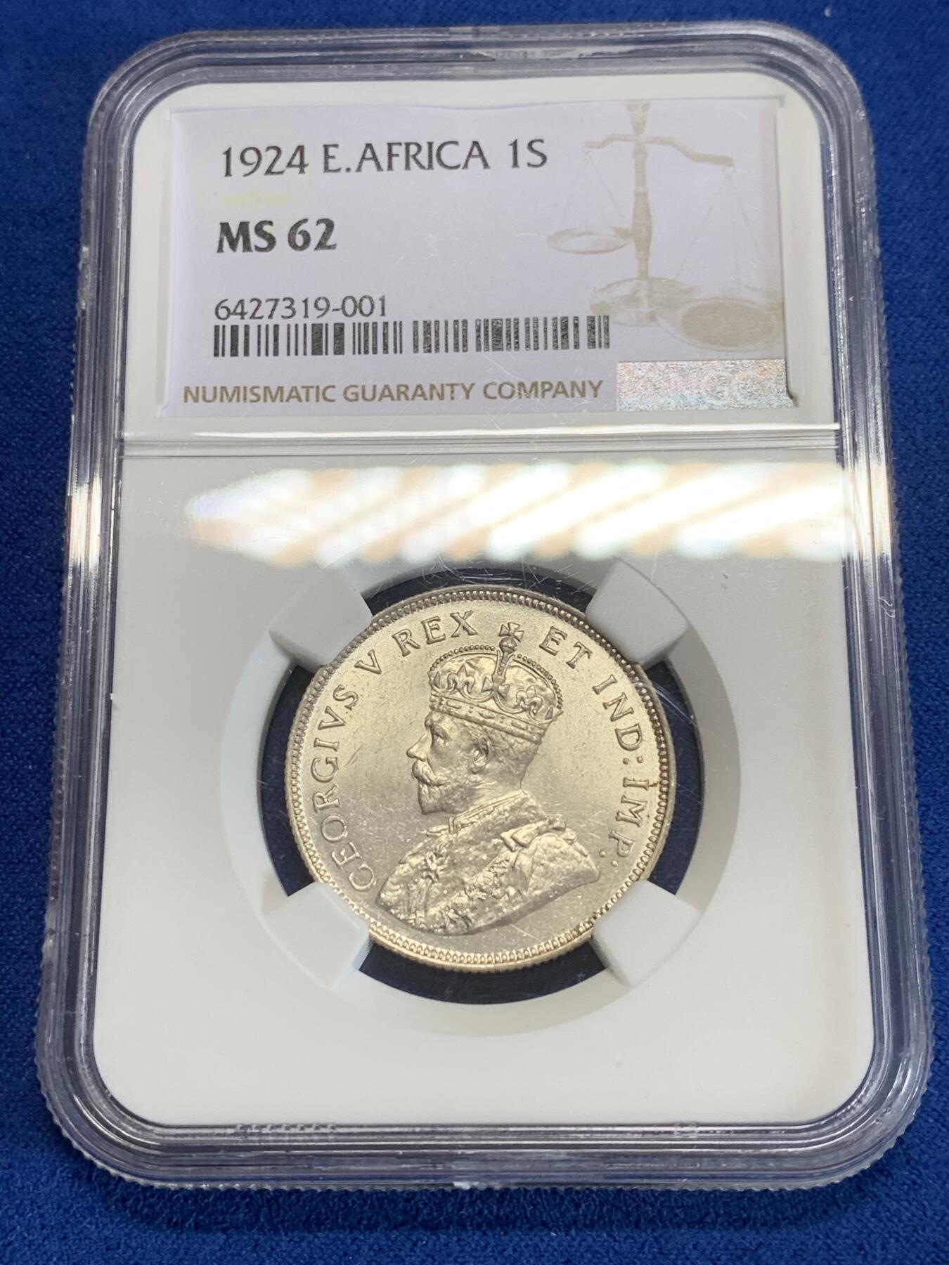 《竞宝斋》第279场- 周日，周一 ，周二3场连拍 （全场包邮） NGC MS62 英属东非1924乔治五世非洲狮银先令，银光丝滑，N盒严评。非洲雄狮肌肉虬结，威风凛凛。此前竞宝斋au58分含佣416元成交
